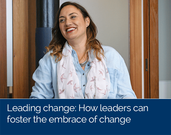Leader smiling wearing scarf. Leading change, how can leaders foster the embrace of change icon.